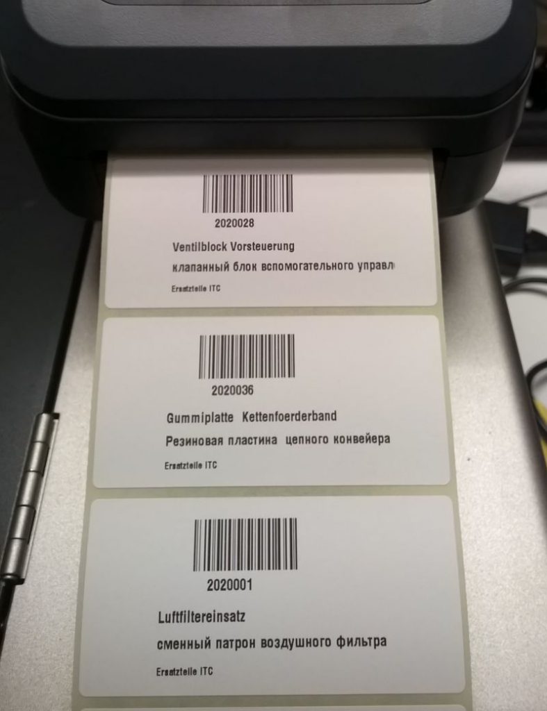 Foto Etiketten Barcode mit Text auf Klebeetikett